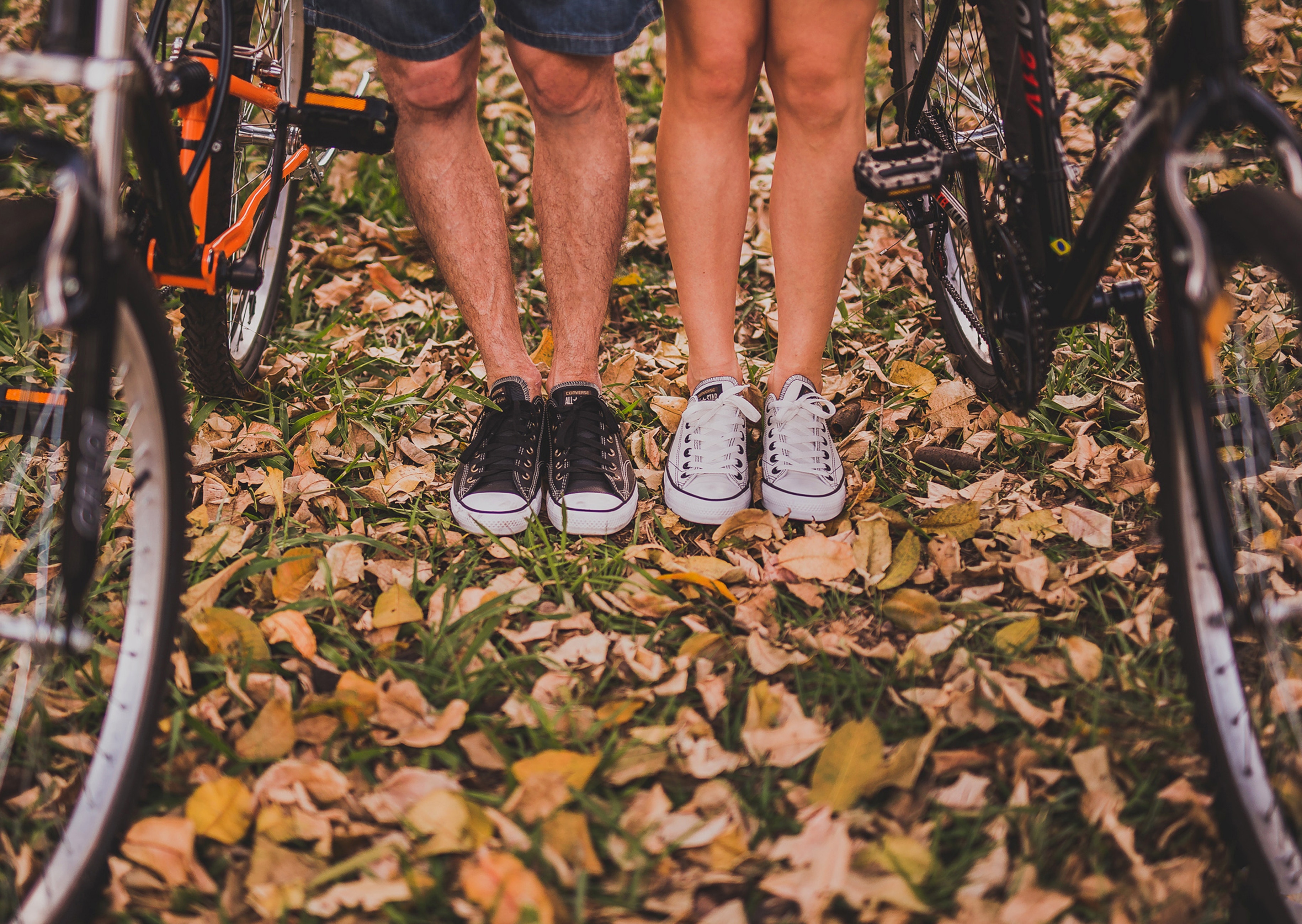 Image of a man a woman's legs with bicycles